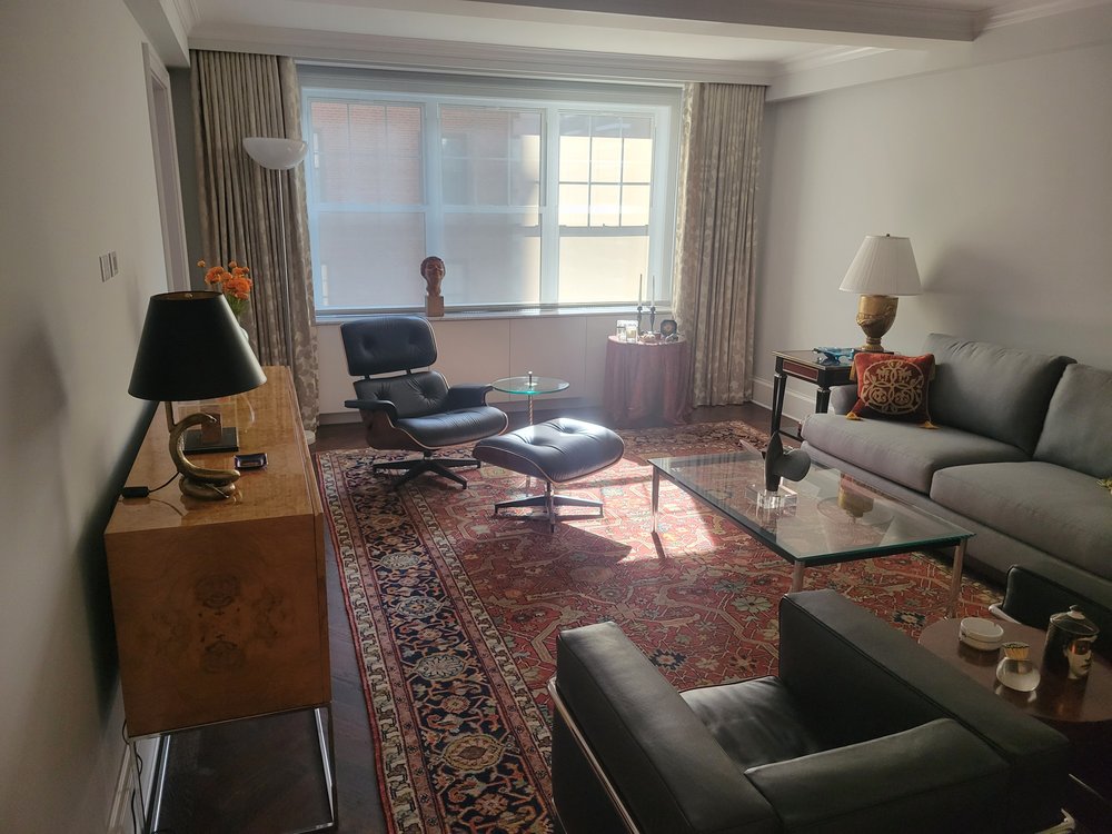 Sophisticated modern living room capturing high-end residential interior design in daylight. The space