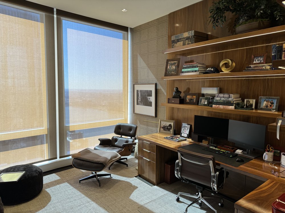 Prestigious high-rise office featuring floor-to-ceiling windows with commanding city views across Manhattan's