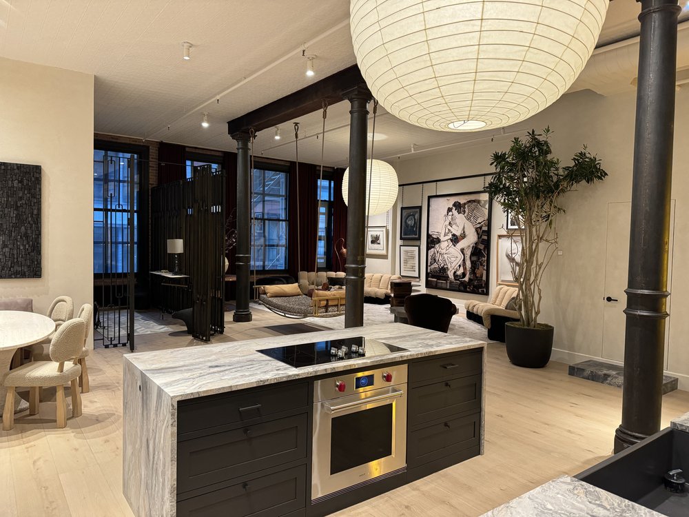 Spectacular high-end kitchen and entertaining space showcasing open-concept design with dual kitchen islands